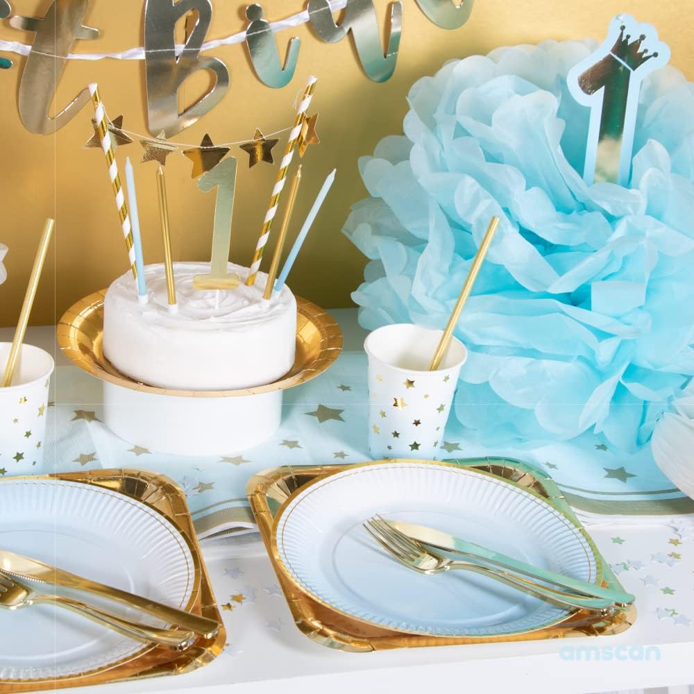 Decorated celebration table with plates and glasses