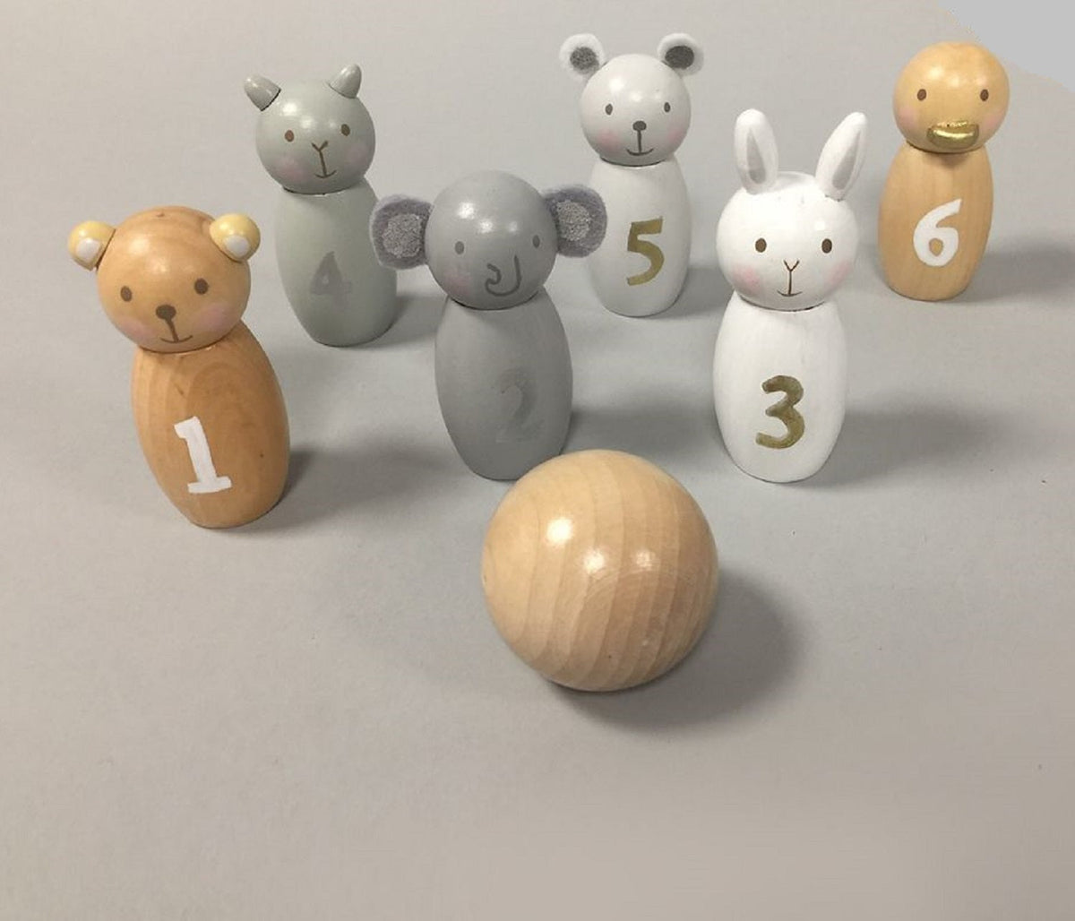 Wooden animal toys and numbered blocks
