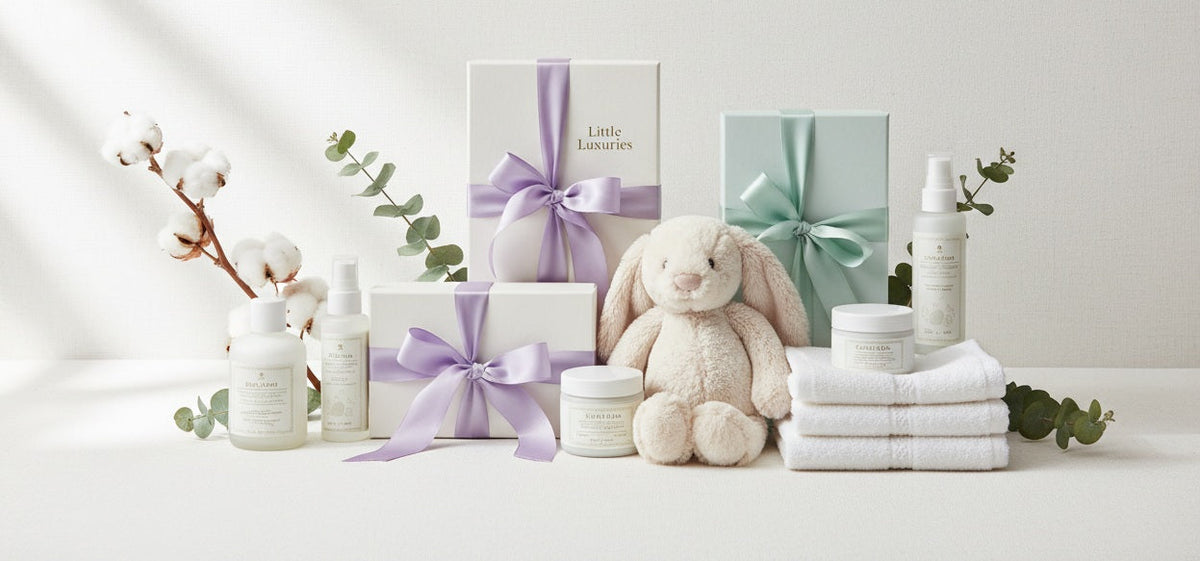 Pastel gift boxes, teddy bear and folded blanket