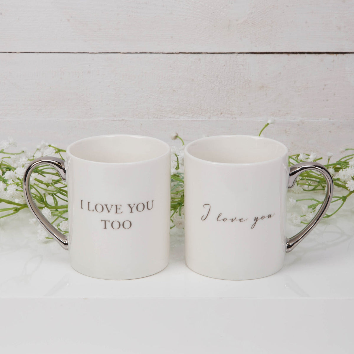 Pair of gift mugs with love messages