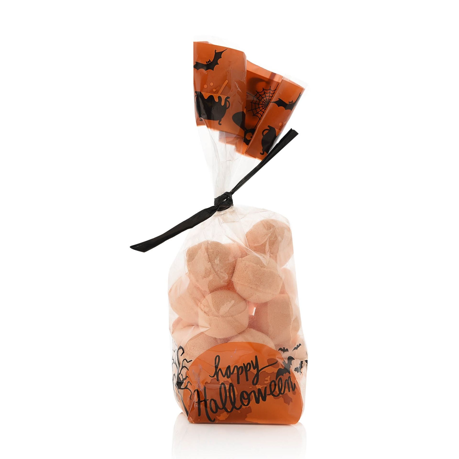 A clear plastic bag filled with orange pumpkin-shaped bath fizzers, secured with a black ribbon and labeled 'Happy Halloween'.